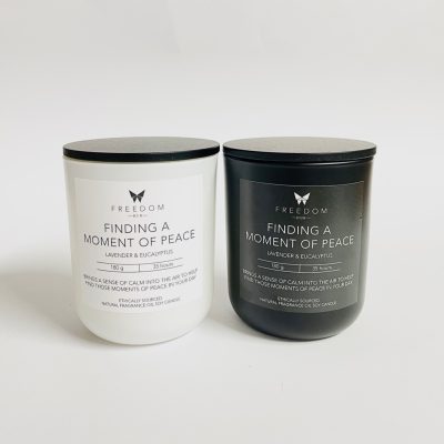 White Soy Candles in white or black glass jars. Each of our candles is inspired by our survivor's powerful journeys of restoration. Hand-poured. Ethical. Australian.