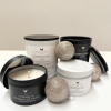 Two large candles as well as two small tin candles